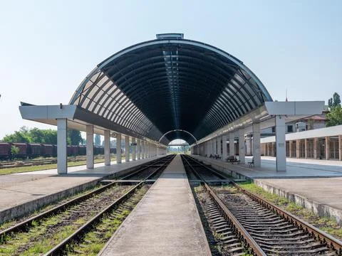 Empty train station. A platform under a glass roof. Stock-Fotos