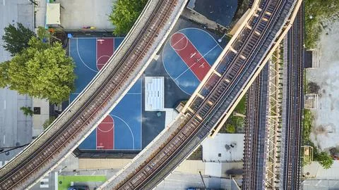 Empty train track, railroad transit, transportation bridges above basketball Stock Photos
