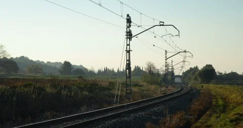 Empty Train tracks through fields on a cold early morning 스톡 동영상 122772125
