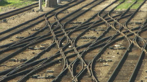 Empty Train yard - small freight engine passes thru shot (mute) Video stock 50003453