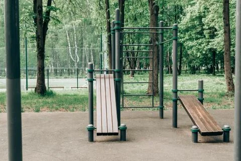 An empty training ground (workout) on the street, horizontal bars and benches Stock Photos