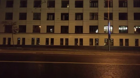 Empty tram 71-931M Knight-M Vityaz-M rides by at night on the background of the Stock Footage 98217502