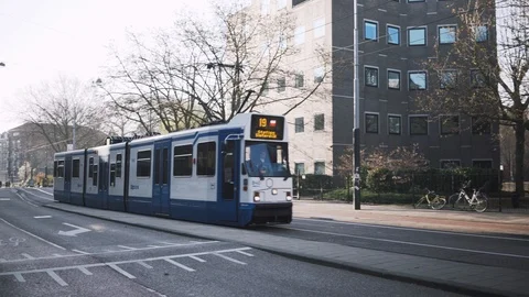 Empty tram making no stops in Amsterdam during coronavirus outbreak. Stock Footage 127292448