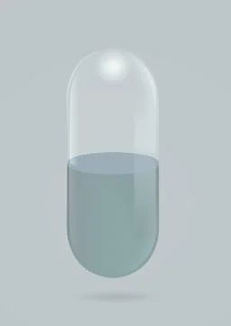 Empty transparent capsule pill isolated on gray background Stock Photos