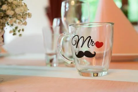Empty transparent glass cup for tea or coffee with a handle Stock Photos