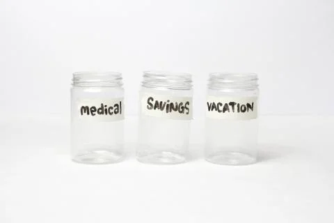 Empty transparent jar with label isolated on white background Stock Photos