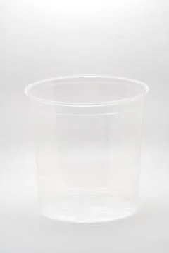 Empty transparent plastic cup isolated on white background Stock Photos