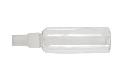 Empty transparent spray bottle on white background. Plastic container for c.. Stock Photos