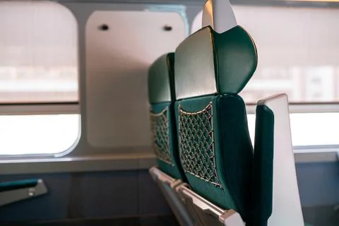 Empty trash basket container in the back of a seat inside a modern train Foto stock