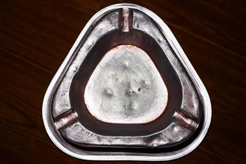 Empty Triangular Metal Ashtray on Wooden Background, Vintage Aluminum Smoki.. Stock Photos