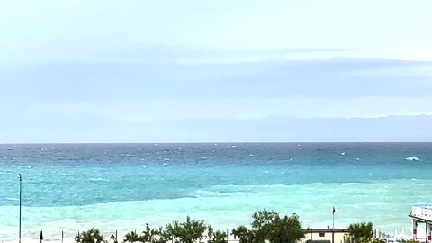Empty Tropial Beach. Sea Waves on the Sand Beach With Palms Tree. Stock Footage 227335546