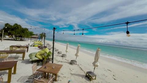Empty Tropical Beach Club With White Sand And Turquoise Water In Bali Stock Footage 337735809