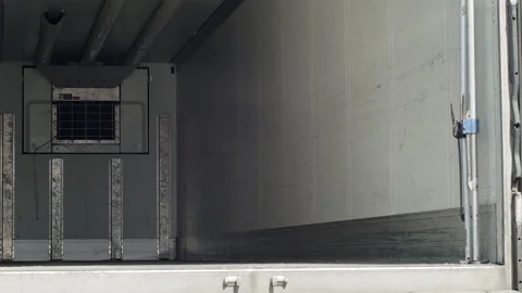 Empty truck inside waiting to fill. parallax effect. Shot on RED Stock Footage 106616442