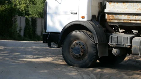 Empty truck leaves the construction site Stock Footage 100271473