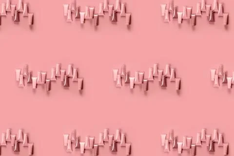Empty tubes for the design of cosmetics on red background. Pattern. Stock Photos