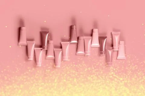 Empty tubes for the design of cosmetics on red background. Stock Photos