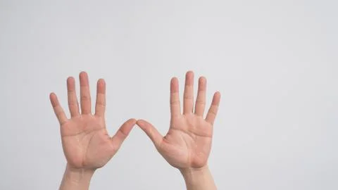 Empty two hands is spreading with palm on white background. Stock Photos