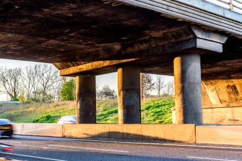 Empty UK Motorway under junction bridge evening 库存照片