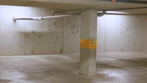 Empty underground concrete parking garage basement 動画素材 338027230