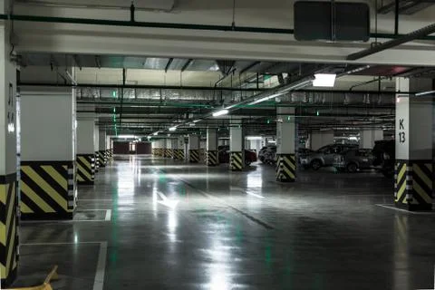 Empty underground parking garage Stock Photos