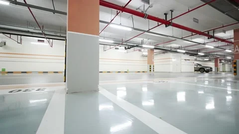 Empty underground parking lot in new residential district Stock Footage 194888276