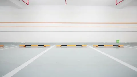 Empty underground parking lot in new residential district Stock Footage 194888281