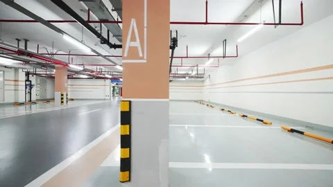 Empty underground parking lot in new residential district Stock Footage 194888366