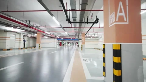 Empty underground parking lot in new residential district Stock Footage 194888382