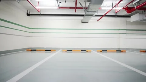 Empty underground parking lot in new residential district Stock Footage 194888396