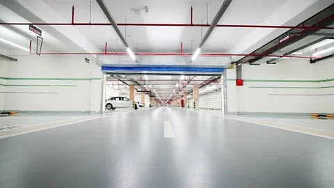 Empty underground parking lot in new residential district Stock Footage 194888649