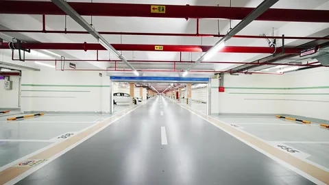 Empty underground parking lot in new residential district Stock Footage 194888697