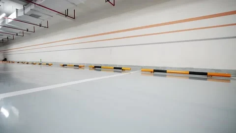 Empty underground parking lot in new residential district Stock Footage 194888798