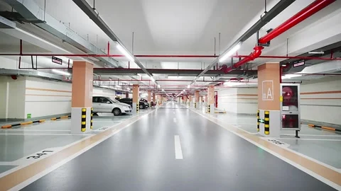 Empty underground parking lot in new residential district Stock Footage 194888959