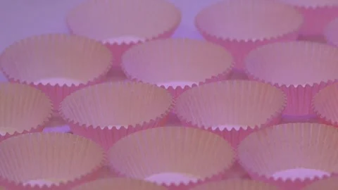 Empty Unfilled Paper Muffin Cupcake Molds Placing On Table Stock Footage 295477697