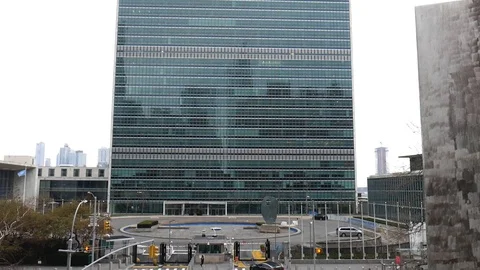 Empty United Nations Building Coronavirus Tilt Up Wide Stock Footage 127941450
