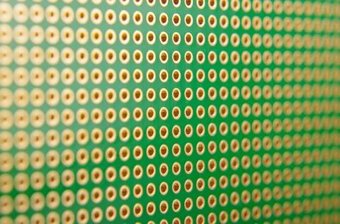 Empty universal PCB for prototyping 스톡 사진