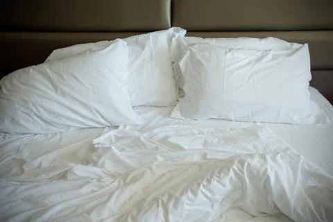 Empty Unmade Bed Stock Photos