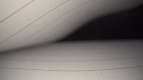 Empty unwritten papers in book sheet sliding dolly out macro closeup Stock Footage 124017933