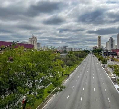Empty urban road under cloudy sky 스톡 사진