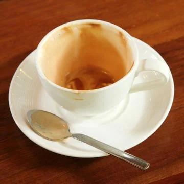 Empty used coffee cup Stock Photos