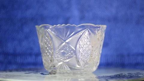 Empty vase rotating on blue background Stock Footage 72814516