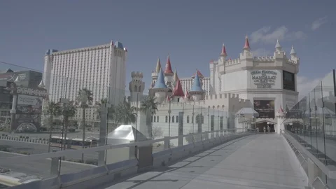 Empty Vegas Strip Overpass with Couple Walking during COVIN-19 Stock Footage 126561771