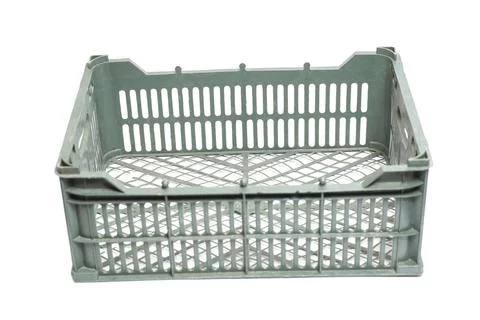 Empty vegetable crate, isolated on white. Stock Photos