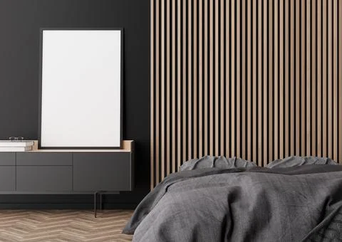 Empty vertical picture frame on black wall in modern bedroom. Mock up interio Stock Photos