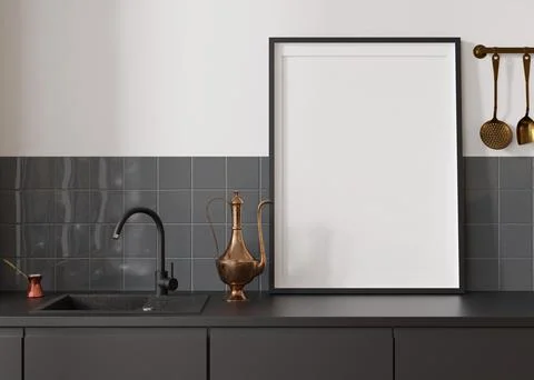 Empty vertical picture frame standing in modern kitchen. Mock up interior in  Foto stock