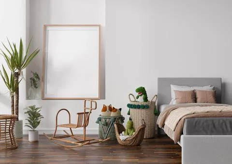 Empty vertical picture frame on white wall in modern child room. Mock up inte Stock Photos