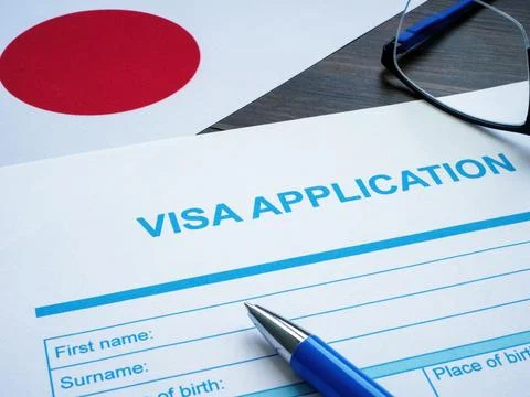 Empty visa application and flag of Japan. Stock Photos