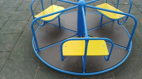 Empty vivid carousel on kids playground 库存影片 153631009