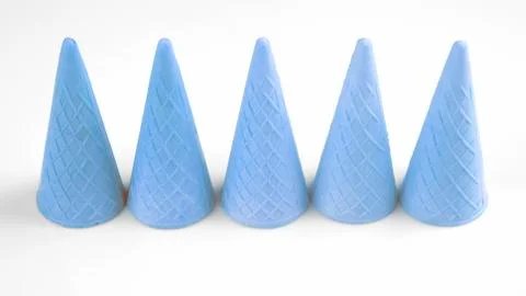 Empty waffle cups on a white background. Preparation for desserts and ice cre Stock Photos