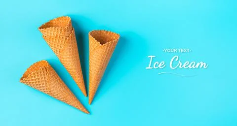 Empty waffle ice cream cups on a light blue background. Foto stock